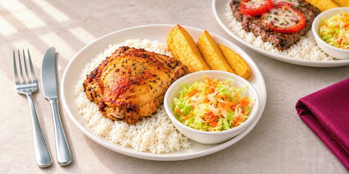 Almuerzo ejecutivo con pollo, arroz y ensalada